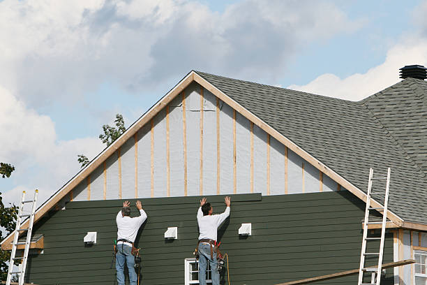 Professional Siding Replacement technician working in Rosman, NC